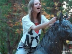 UhPorn presents: Cute chick in jeans poses and strips outdoors