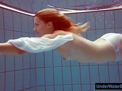 UhPorn presents: Redhead in a white dress and sexy bikini