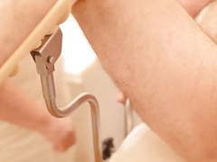 UhPorn presents: Cfnm femdom mature doctor examining a pathetic slave