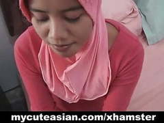 UhPorn presents: Asian amateur in head scarf sucks then fucks