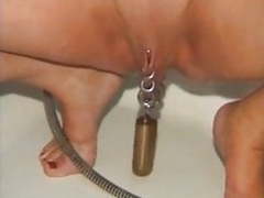 UhPorn presents: Pierced nipples and pussy mature slave in bdsm action