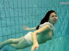 UhPorn presents: Girl in white panties swims in pool