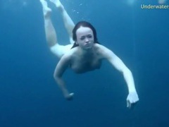 UhPorn presents: Three ladies get naked swimming in the ocean