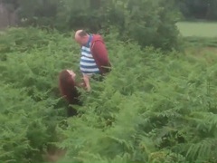 UhPorn presents: Busty wife jerks off a stranger in a field