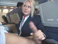 UhPorn presents: Babe on a plane giving a handjob