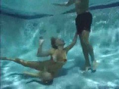 UhPorn presents: She has a threesome underwater