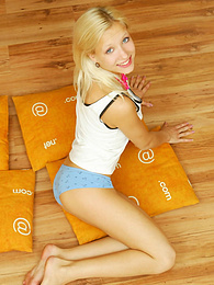 UhPorn presents: Amazing blonde nude teen decided to place herself at the attic of her wooden house on four orange pillows for her dirty intention.