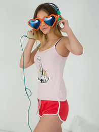 UhPorn presents: This doll really knows how to have fun with her and how she can show off her pussy and listen to some beats at the same time.