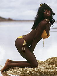 UhPorn presents: Amazing long hair ebony babe in bikini sexy posing outdoor