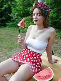 UhPorn presents: Nice belarusian stunner Rokki removes all clothes on a blanket in a backyard