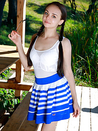 UhPorn presents: Fresh-Faced russian beauty Mia Grandy gets totally naked on a picnic table in a garden